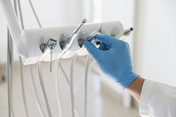 Professional Root Canal Treatment technician working in Nicoma Park, OK